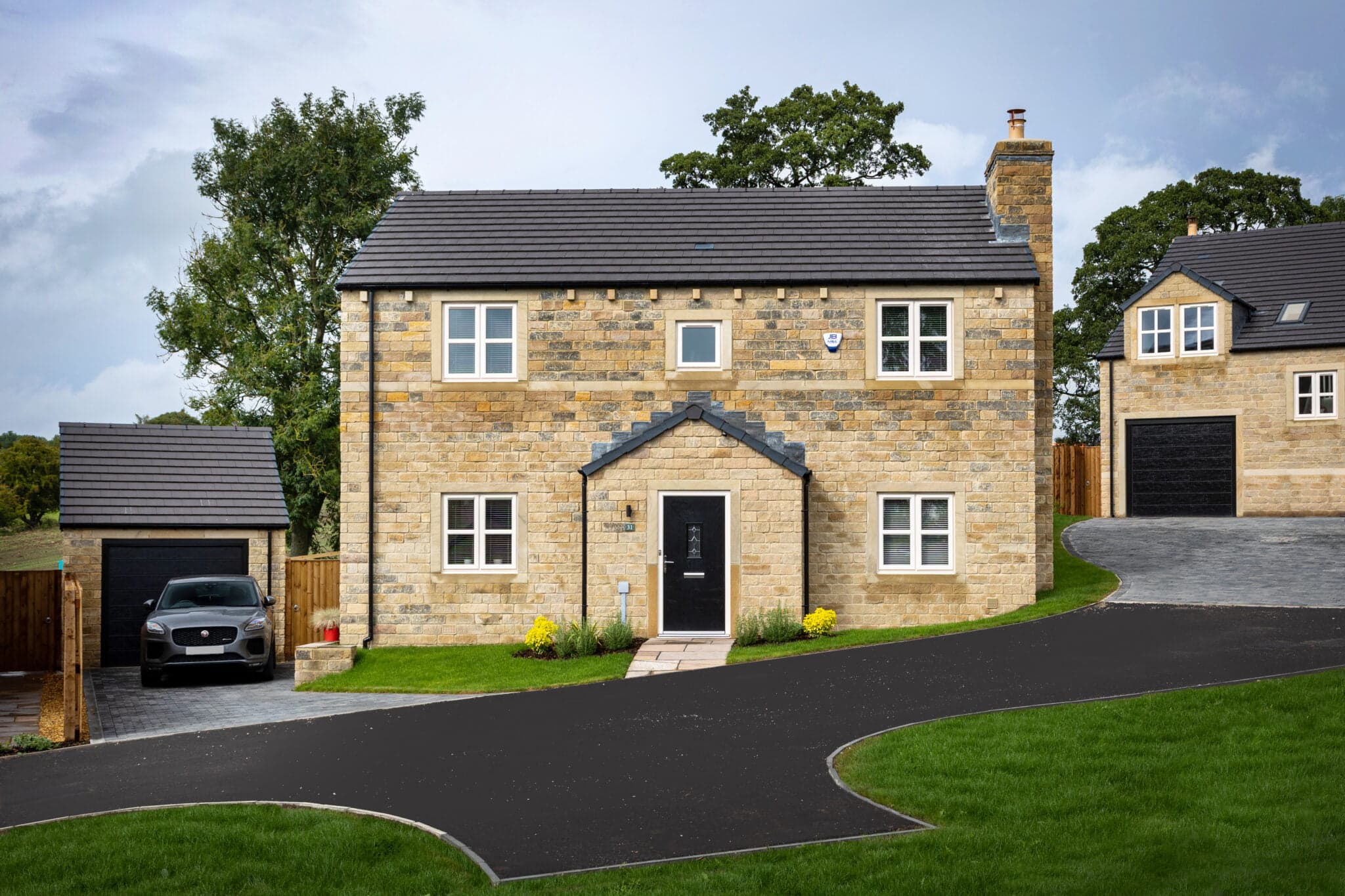The Hartford, a detached natural stone home at Bolton Gardens, Silsden