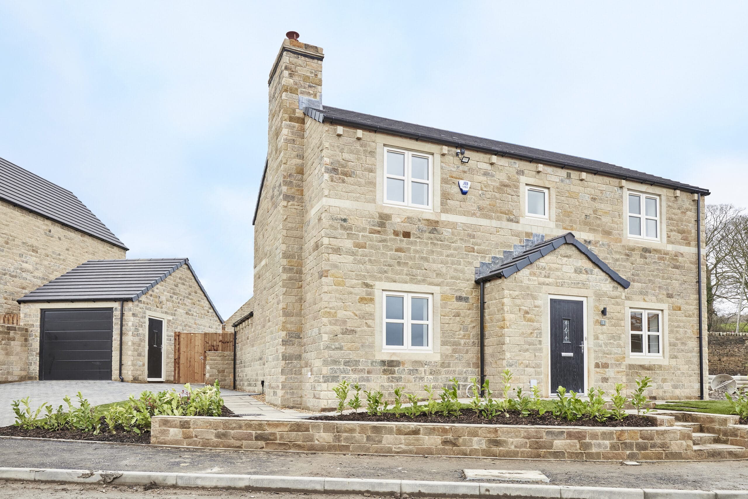 The Hartford, a detached natural stone home at Bolton Gardens, Silsden